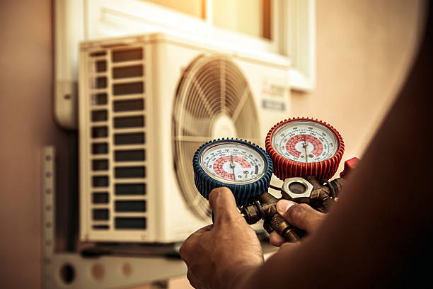 Professional Air Conditioning Service technician working in Christmas, FL